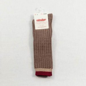 Calcetines altos labrados beige con lista en el puño